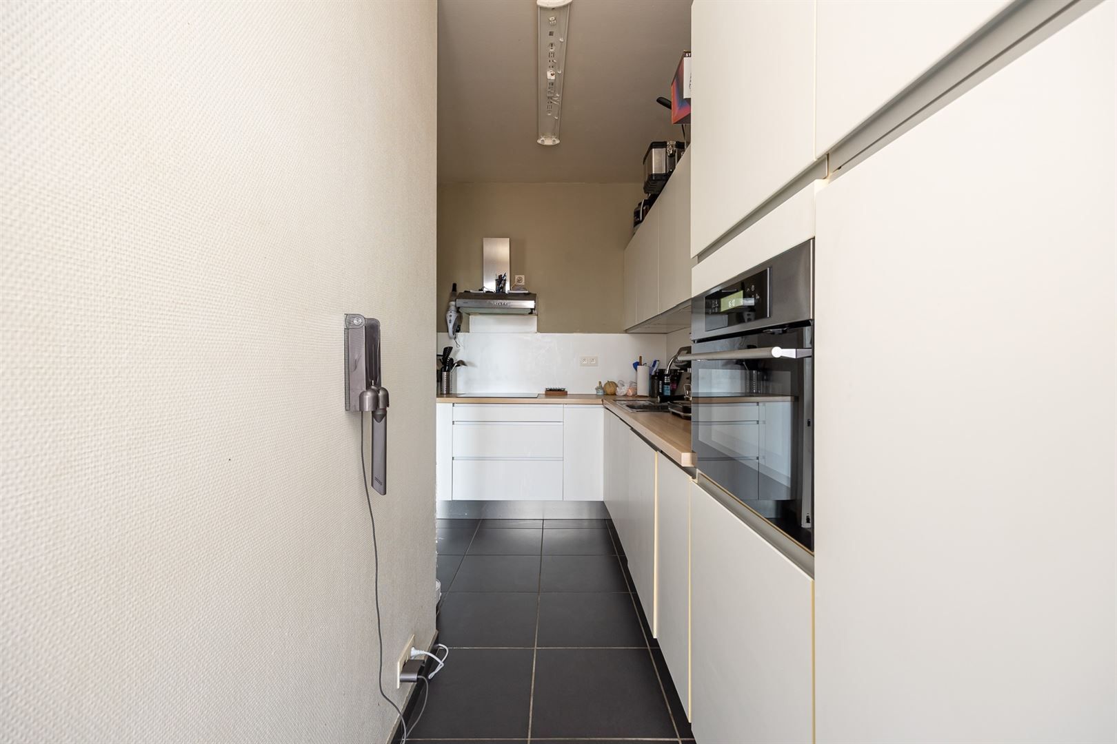 Opbrengsteigendom met 5 appartementen en garages foto 31