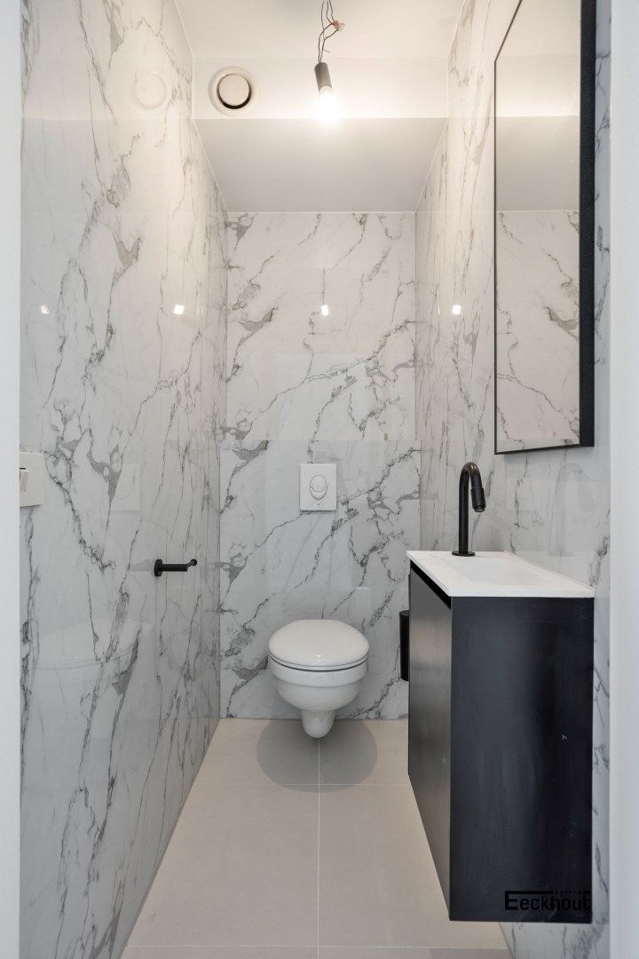 Luxe hoek-appartement met grote zonneterrassen rondom en vlakbij de zeedijk van Mariakerke! foto 19