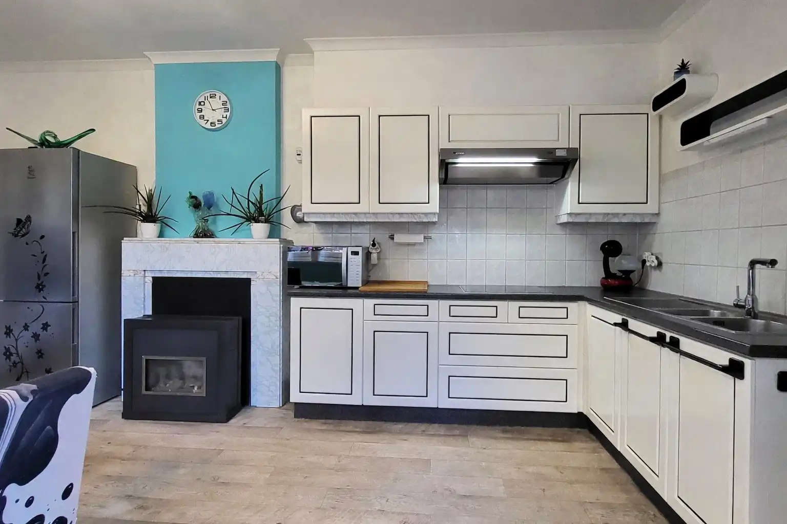 Deze charmante en verrassend ruime woning combineert karakter met hedendaags comfort en is gelegen op een perceel van 341 m² met een zuidwestgericht terras. foto 16