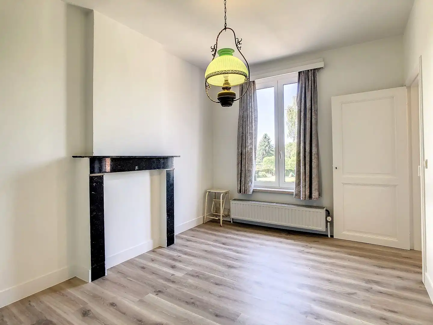 Centraal gelegen woning met twee ruime slaapkamers, zonnige tuin en droge kelder - EPC 252 kWh/m² - bewoonbare oppervlakte van 143 m² foto 12