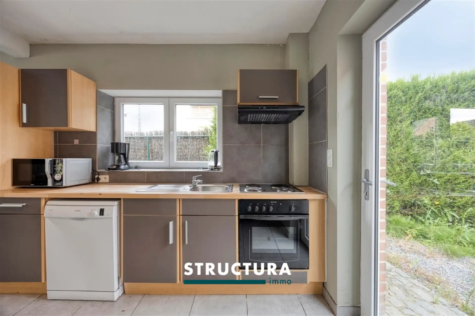 Unieke woning met polyvalent bijgebouw foto 10