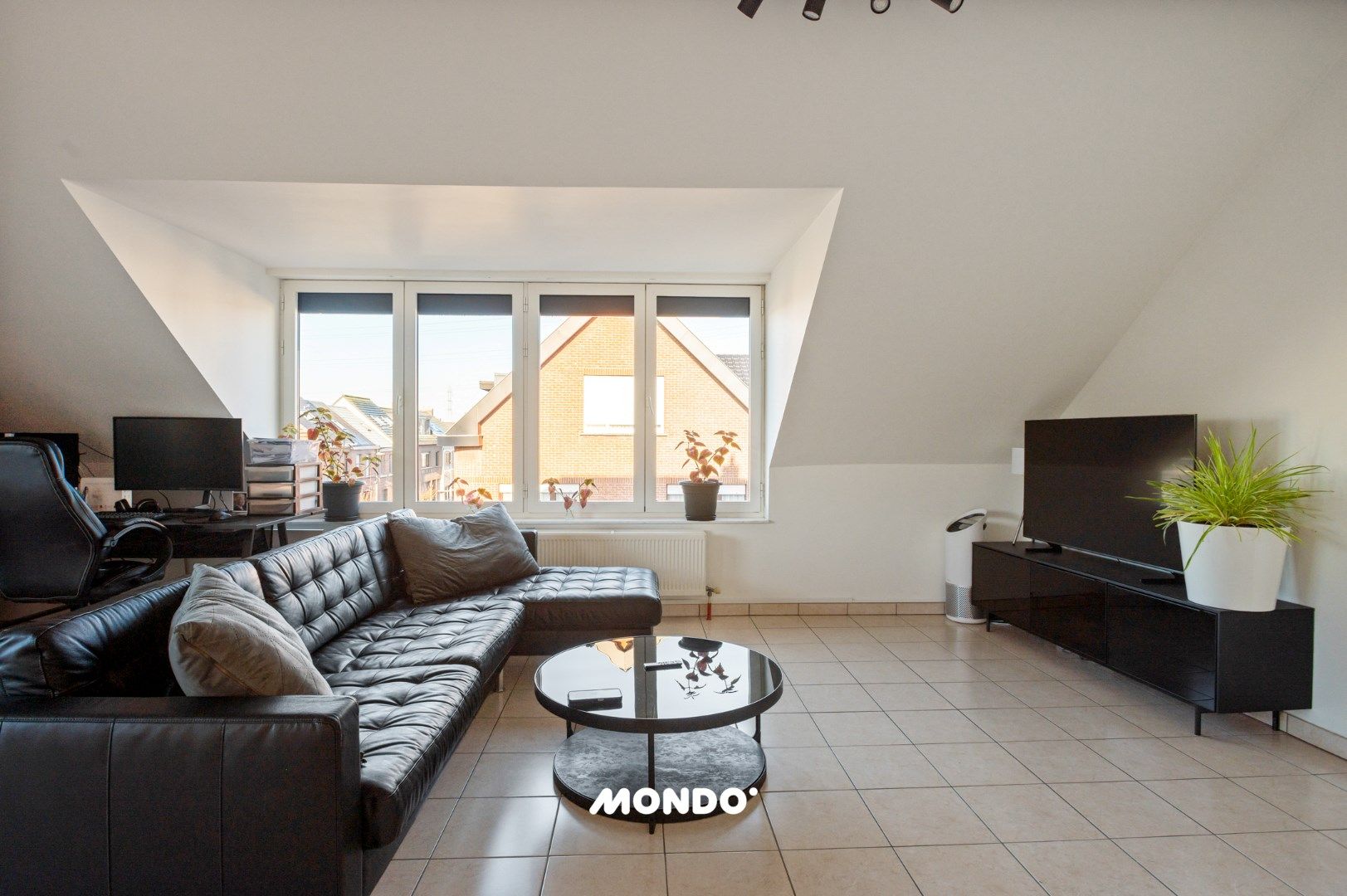 Instapklaar dakappartement met terras in Niel, 1 slaapkamer, bouwjaar 2007, EPC label C, centraal gelegen foto 4