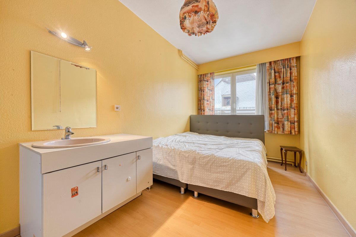 Karaktervolle stadswoning met handelsruimte, tuin en ruime garage in hartje Tongeren foto 13