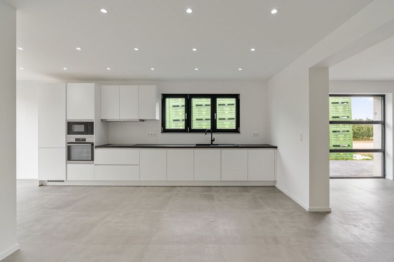 Totaal gerenoveerde woning, gelegen op 7are in een zeer rustige straat foto 8