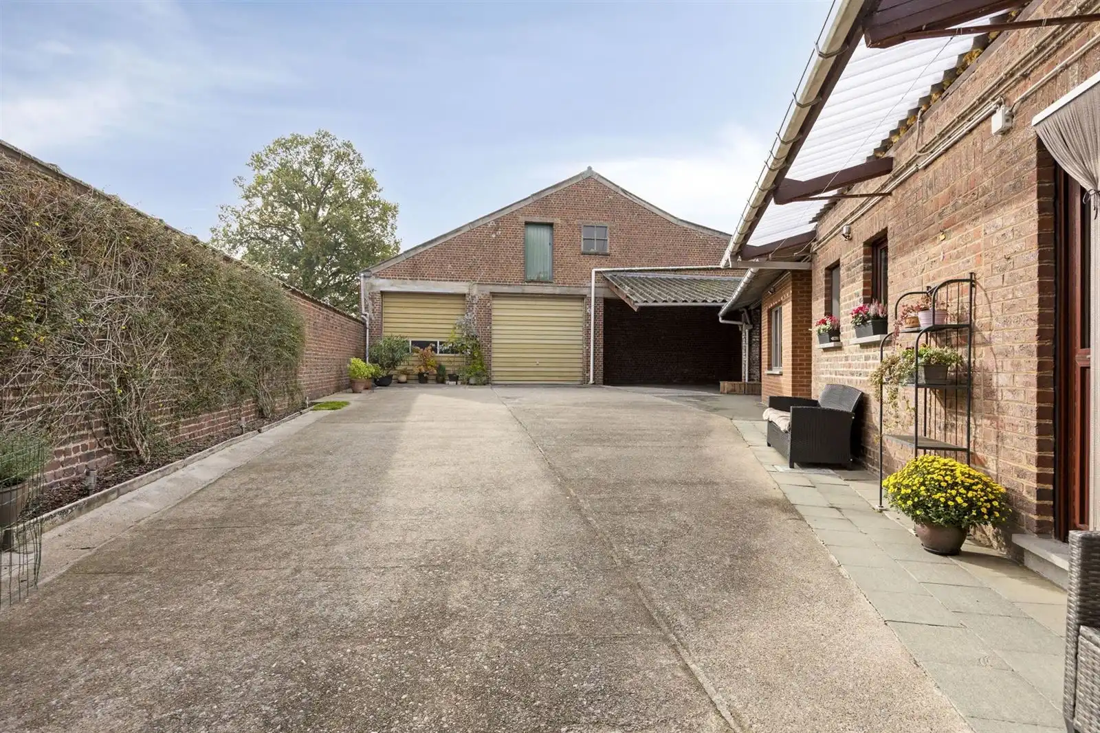 Woning met ruime loods te koop foto 42