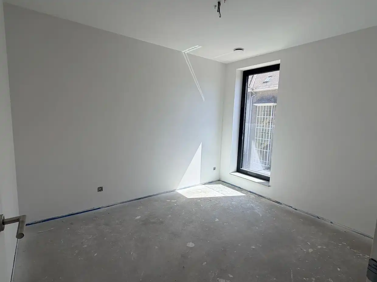 Modern nieuwbouwappartement met 2 slaapkamers en ruim terras in centrum Lubbeek foto 11