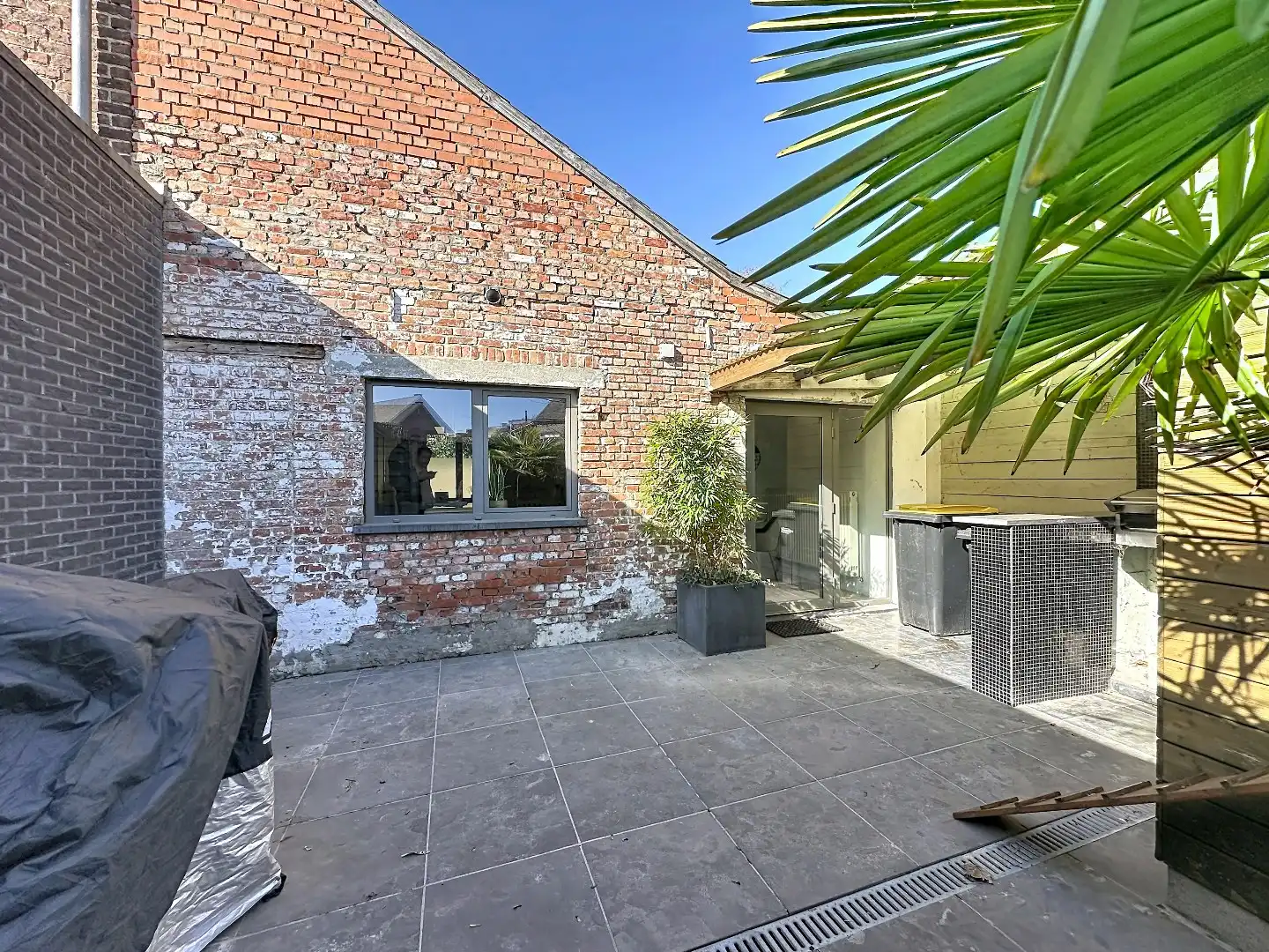 Instapklaar huisje met zonnig terras in Herent foto 18