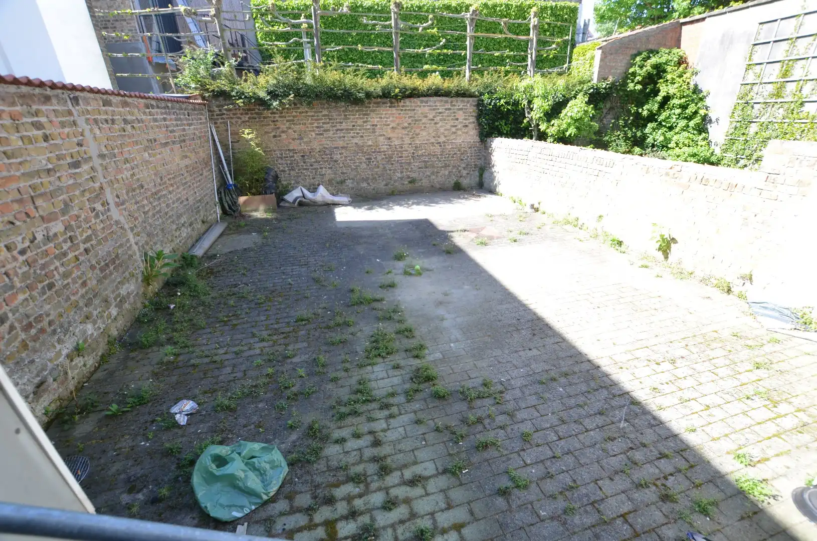 Gelijkvloers appartement met grote koer foto 8