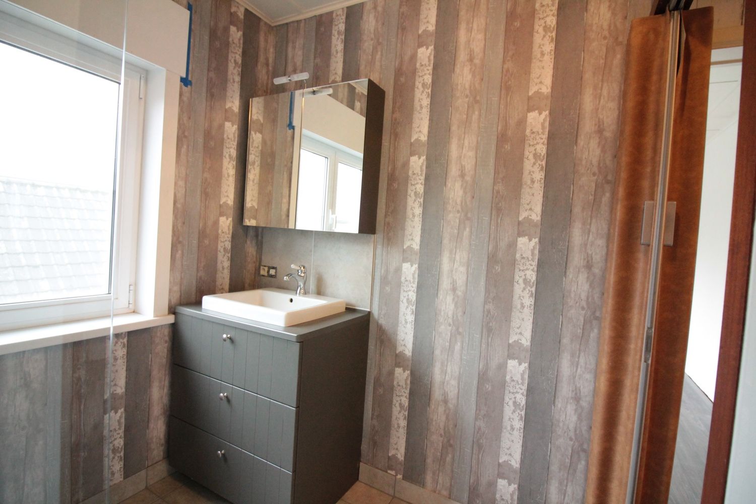 Zeer charmante rijwoning foto 9
