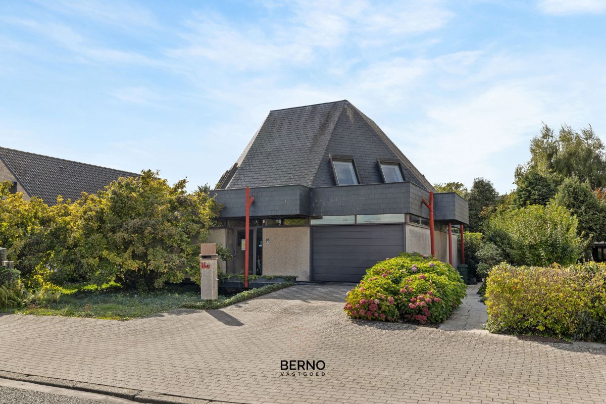 Energiezuinige architectenwoning met tuin in Grembergen foto {{pictureIndex}}