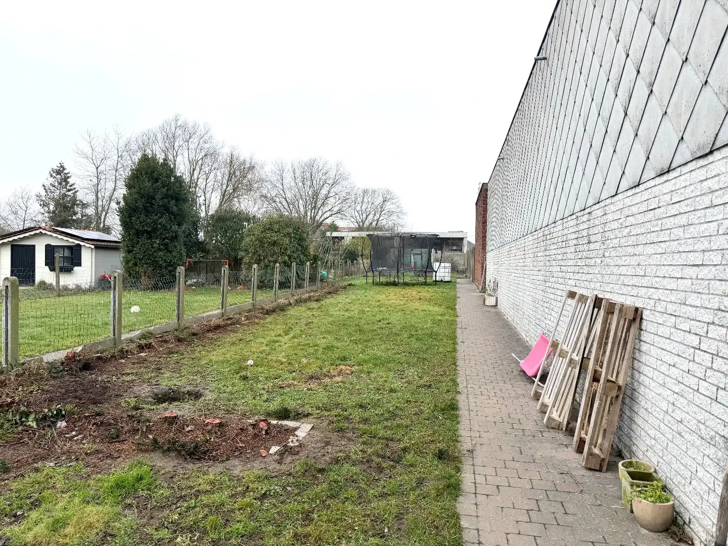 🏡 Te koop in Kooigem – Charmante rijwoning met grote garage & tuin! foto 24