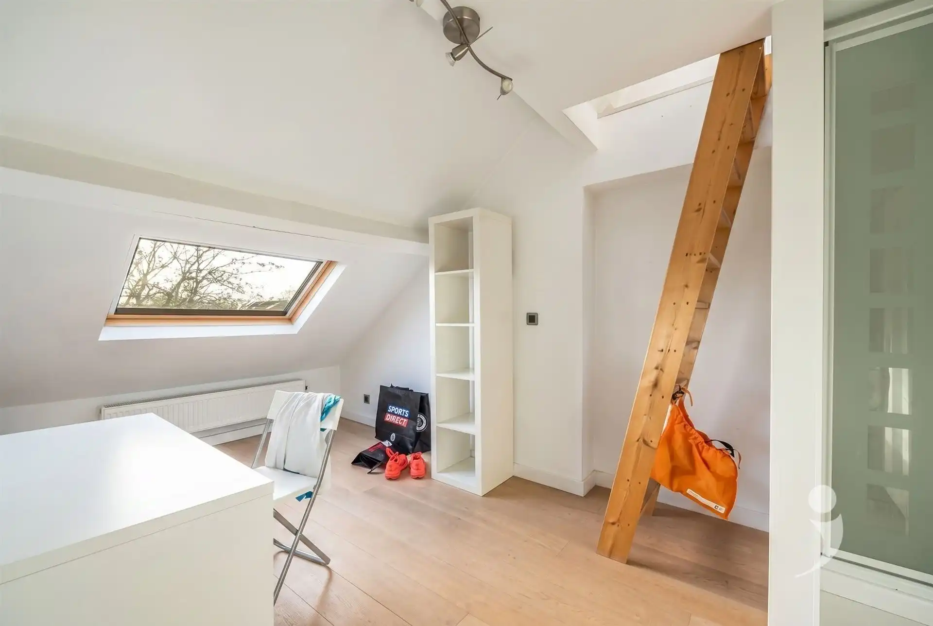 Opbrengsteigendom met handelspand, studio en 6 studentenkamers in Leuven foto 4