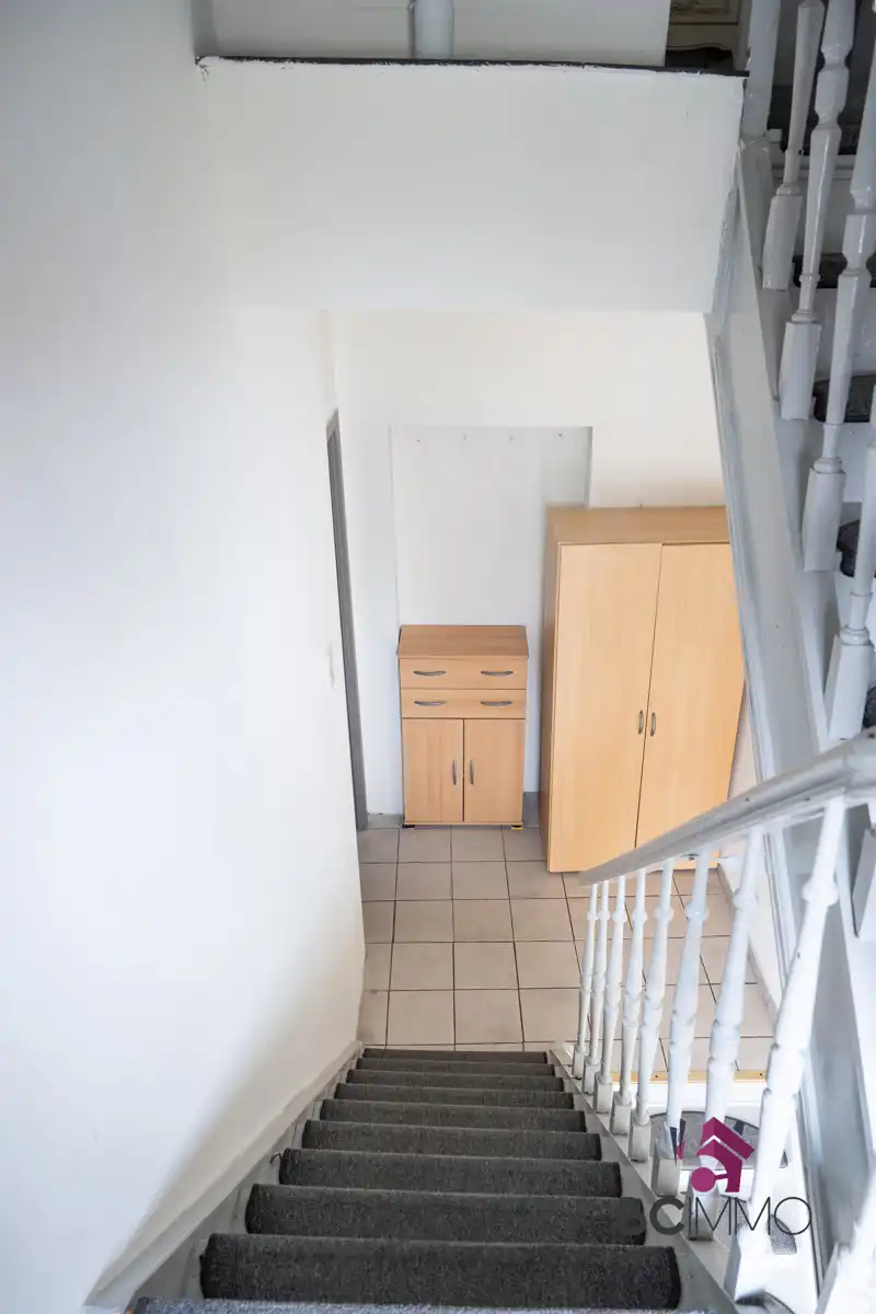 Ruime gezinswoning met projectgrond in Genk foto 17