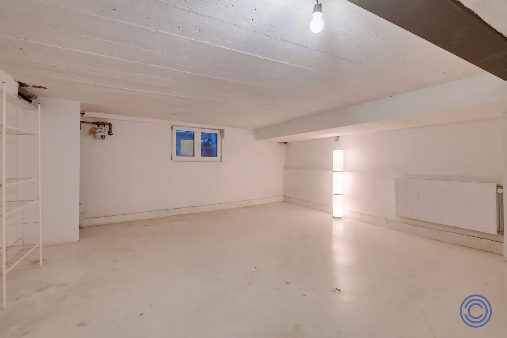 Veelzijdig pand met stadskoer en ruime kelder op toplocatie nabij het Eilandje foto 9