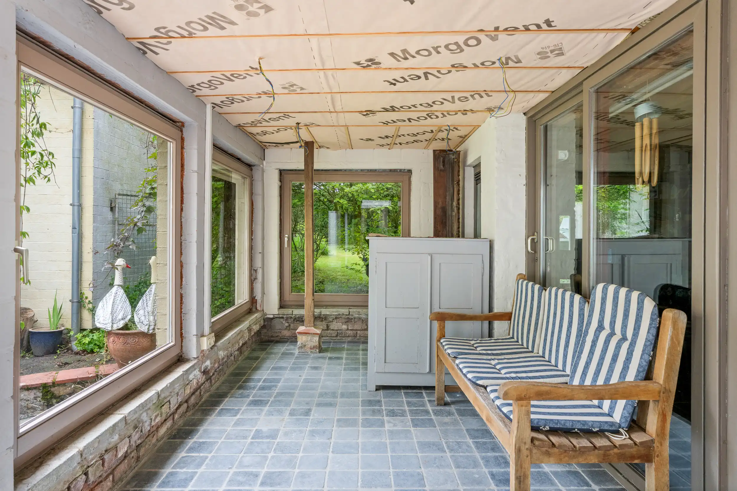 Charmant hoevetje met bijgebouwen in groen kader foto 6