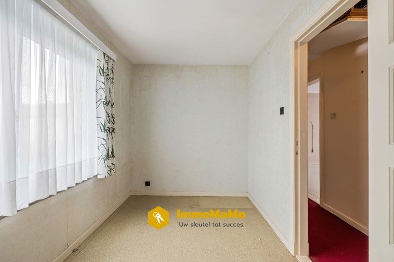 Te renoveren woonst in een rustige wijk te koop in Moerbeke foto 14