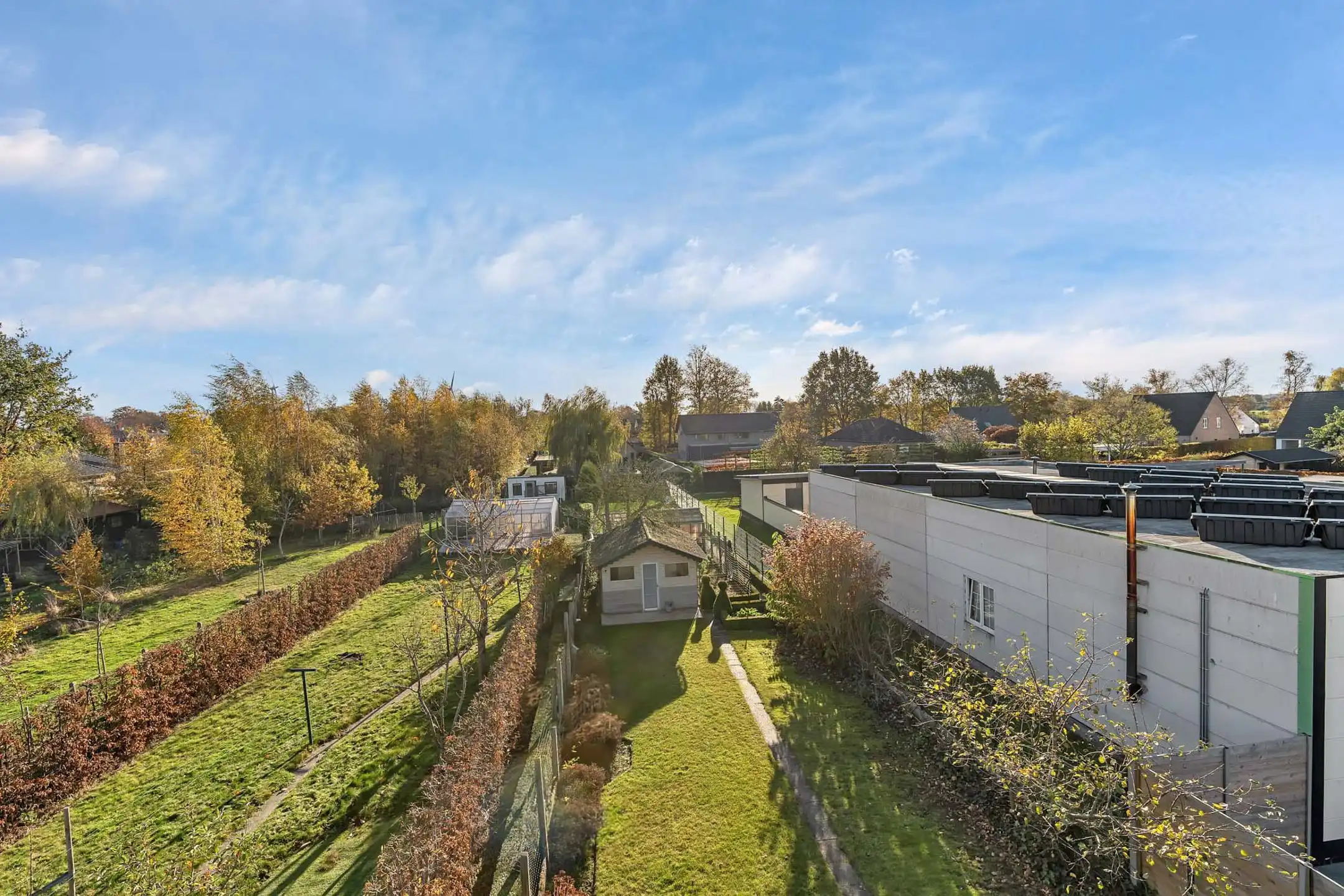 Te renoveren halfopen woning met losstaande garage en grote tuin  foto 17