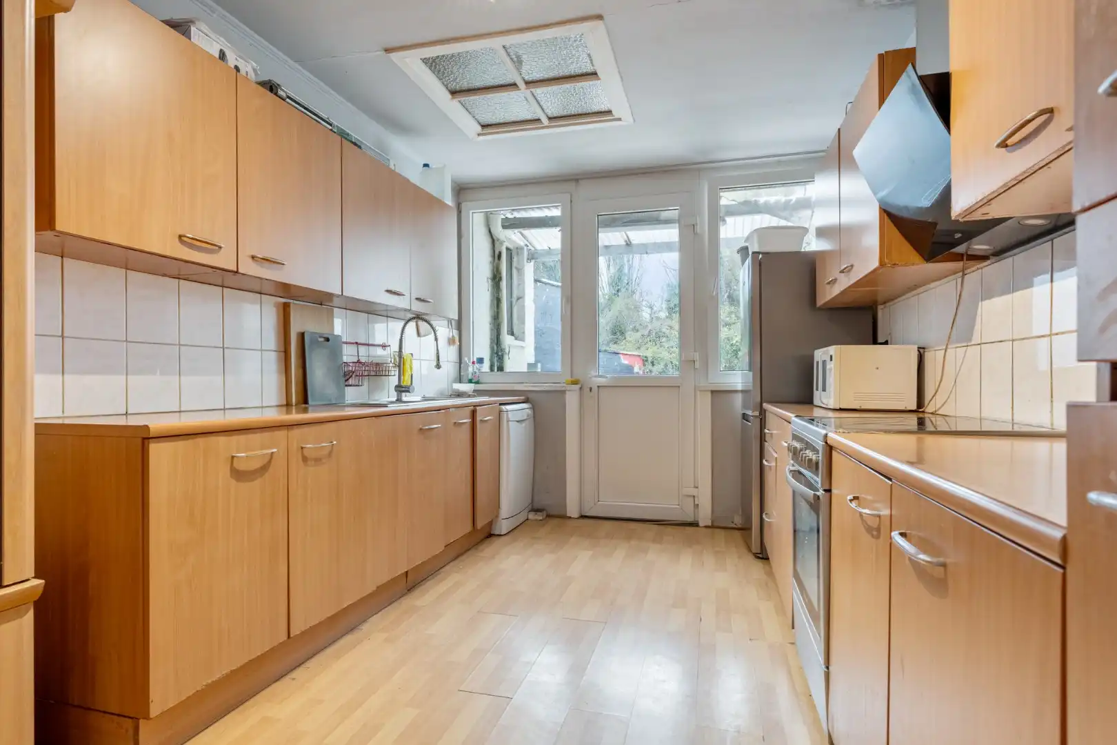 Deels gerenoveerde woning met stadstuin, 3 slpk, 2a60ca, tussen de kleine en grote ring  foto 6