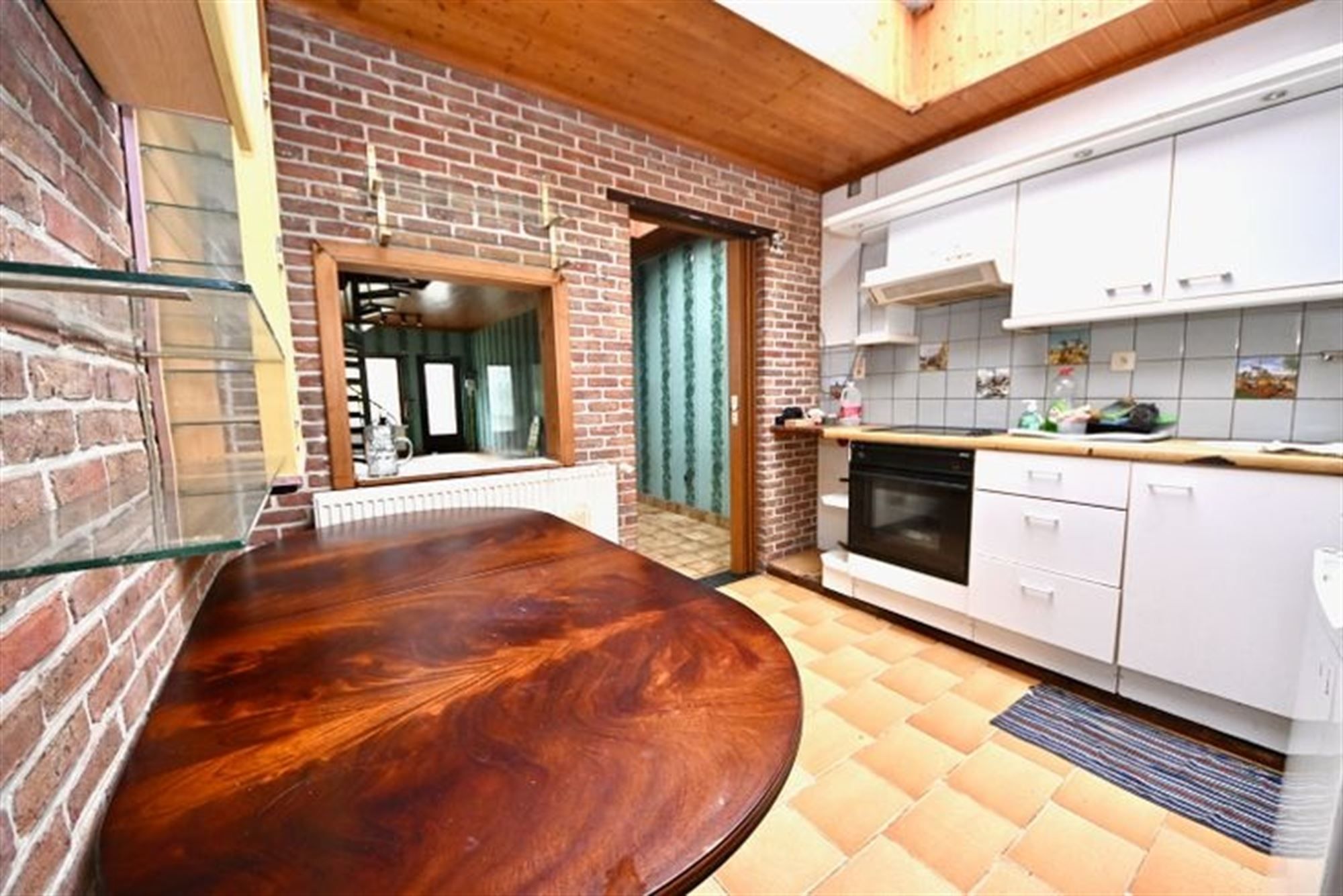 Te renoveren woning met 2 slaapkamers en tuin. foto 7
