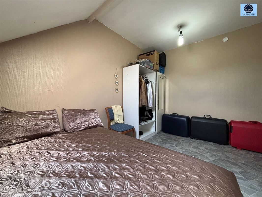 WONING MET 5 SLAAPKAMERS EN STADSTUINTJE. foto 9