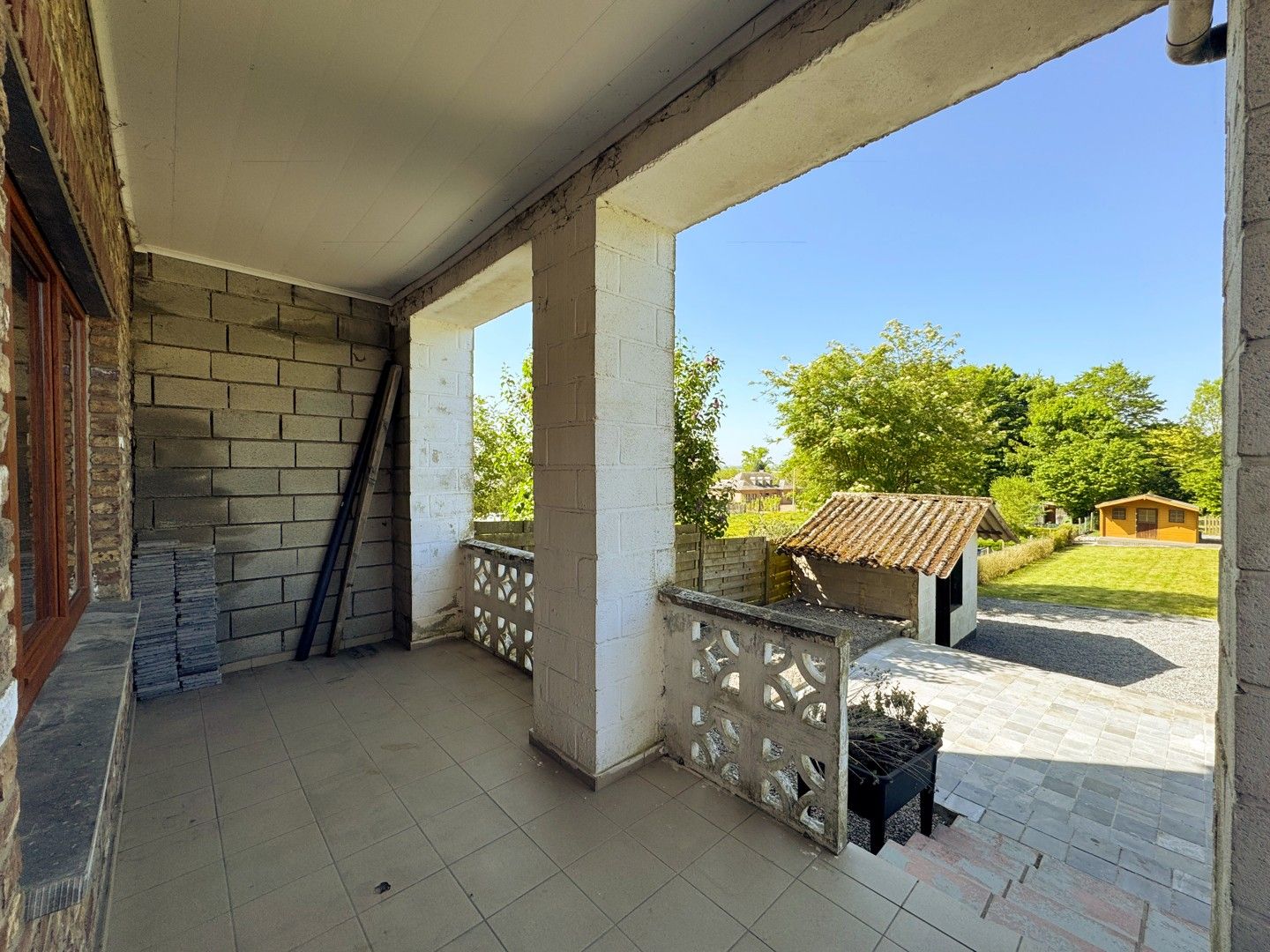 Opbrengsteigendom met potentieel in hartje Borgloon – Tweewoonst met tuin en terras foto 9