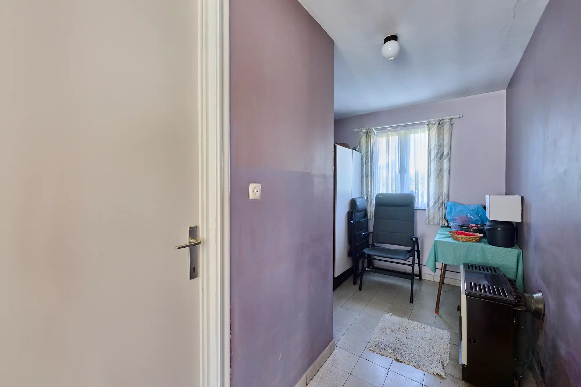 Rustig gelegen te renoveren woning op perceel van 10a50ca foto 10