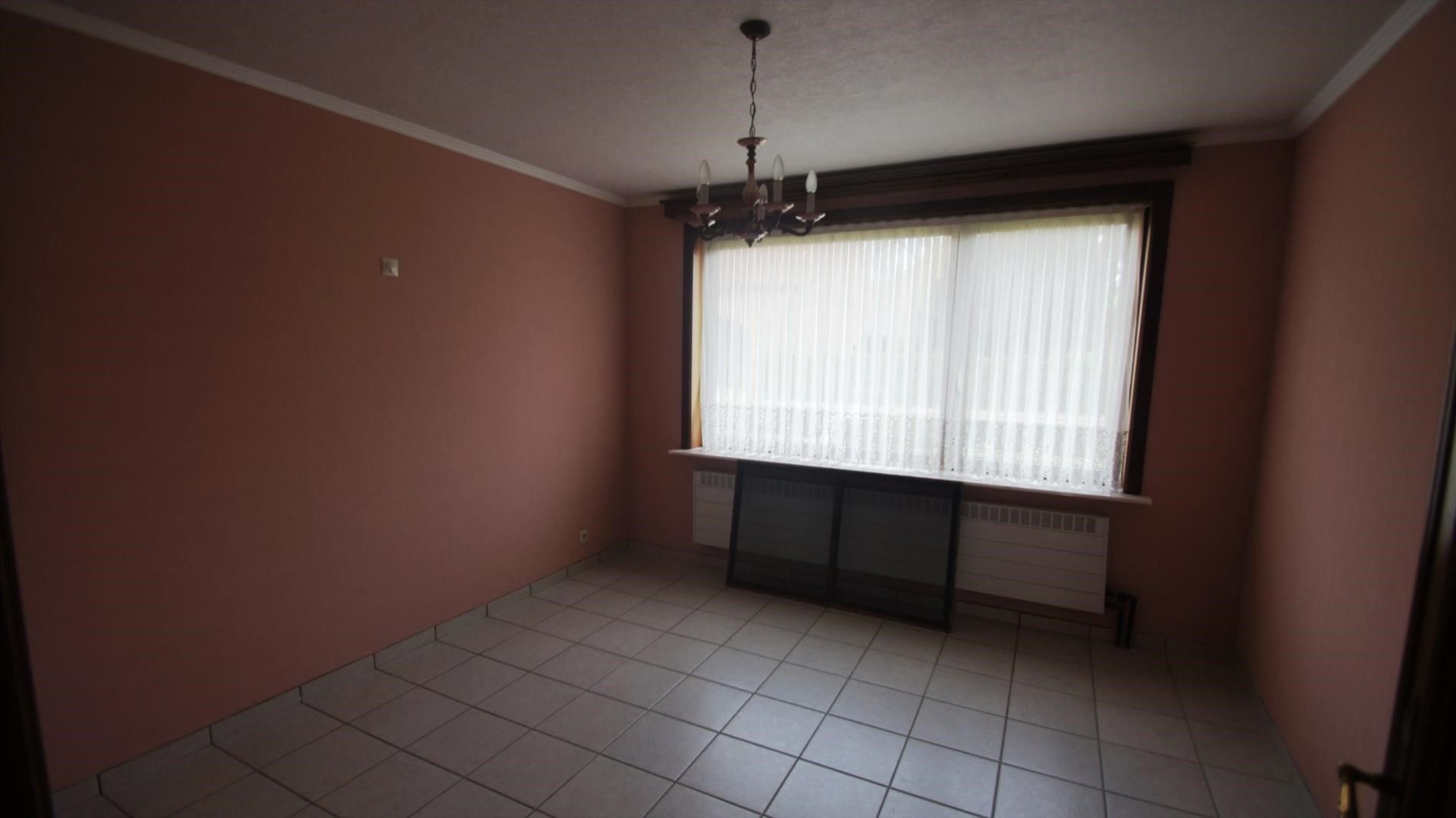 Ruime woning met 2 slpks en mooie tuin foto 12