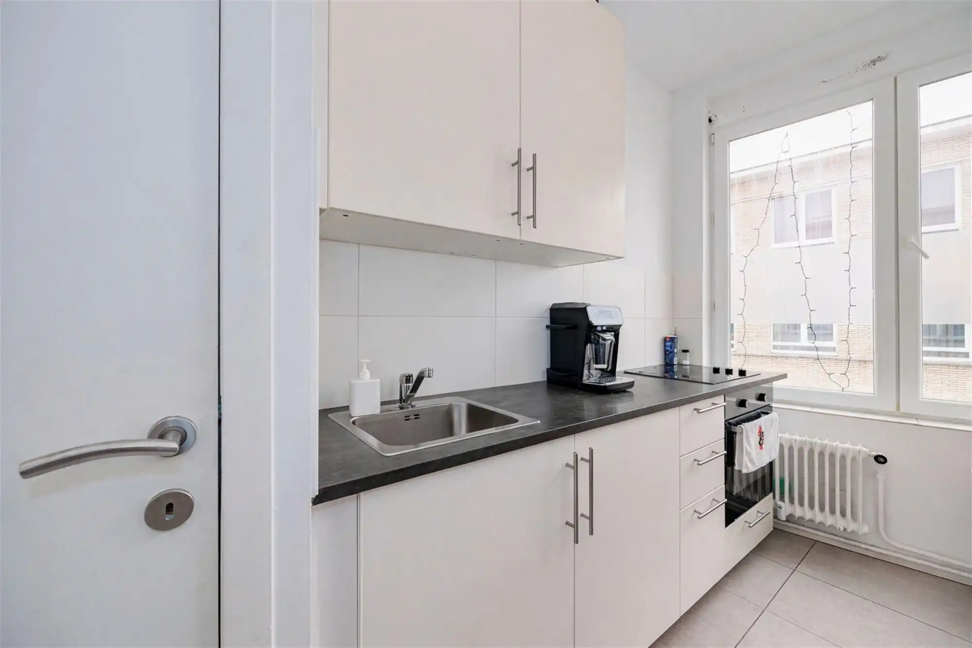 Licht hoekappartement met 1 slk aan het oude Gerechtsgebouw foto 5