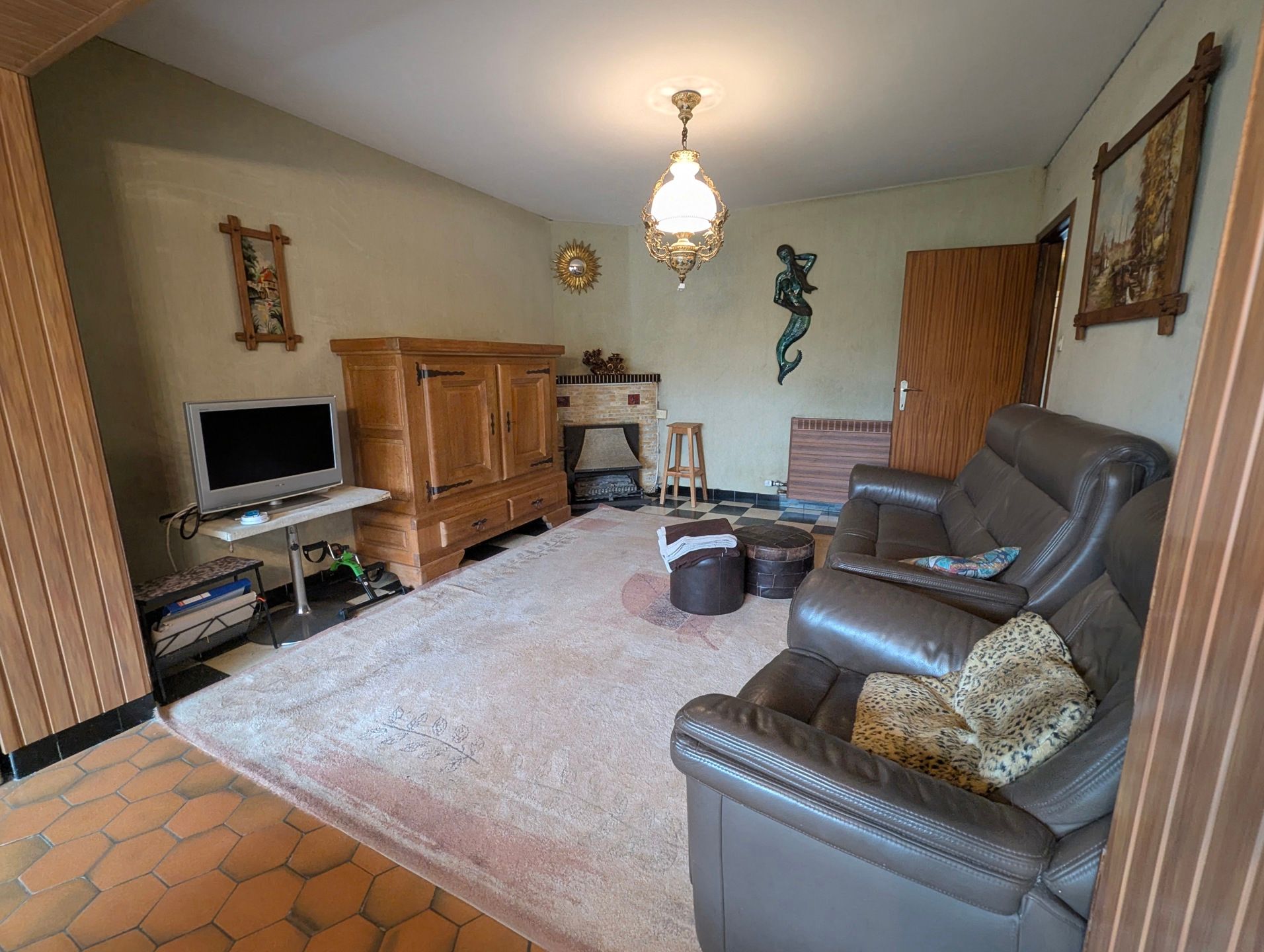 Ruime woning met zongerichte tuin te koop. Centrum De Panne aan zee. foto 7