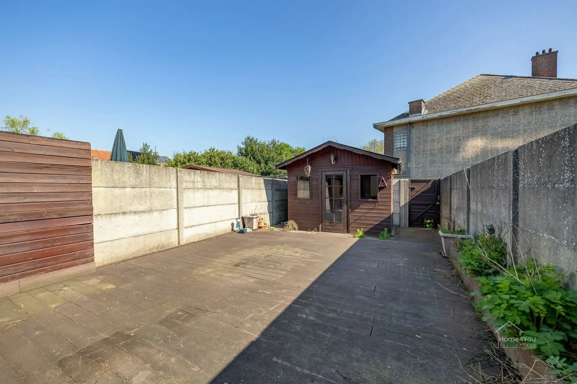 Te renoveren rijwoning met tuintje foto 10