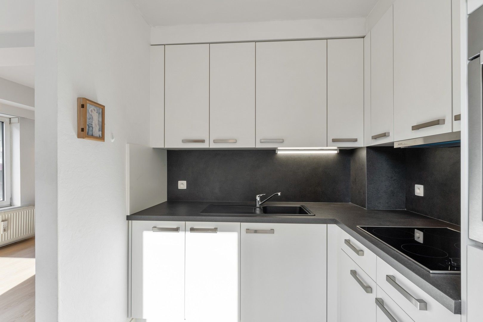 APPARTEMENT MET 2 SLAAPKAMERS IN HET HART VAN SINT-TRUIDEN. foto 7
