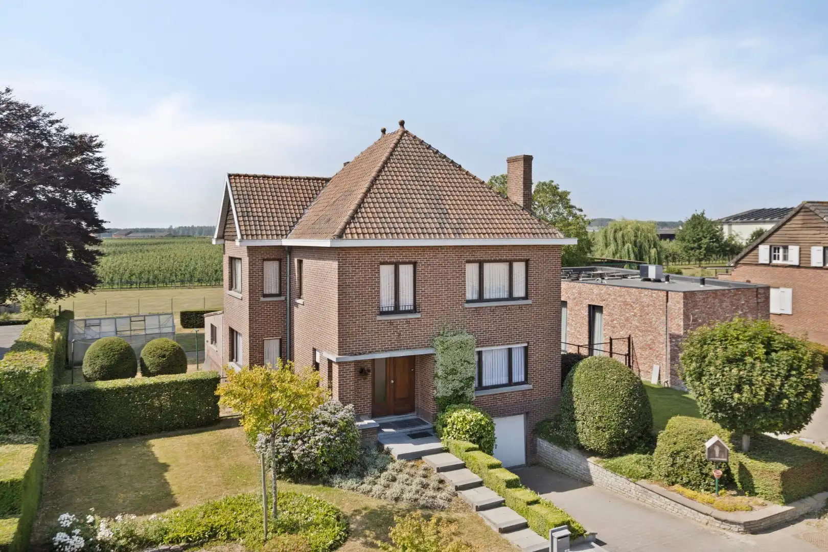 Vrijstaande woning met karakter en blijvend groene verzichten in Wintershoven foto 3
