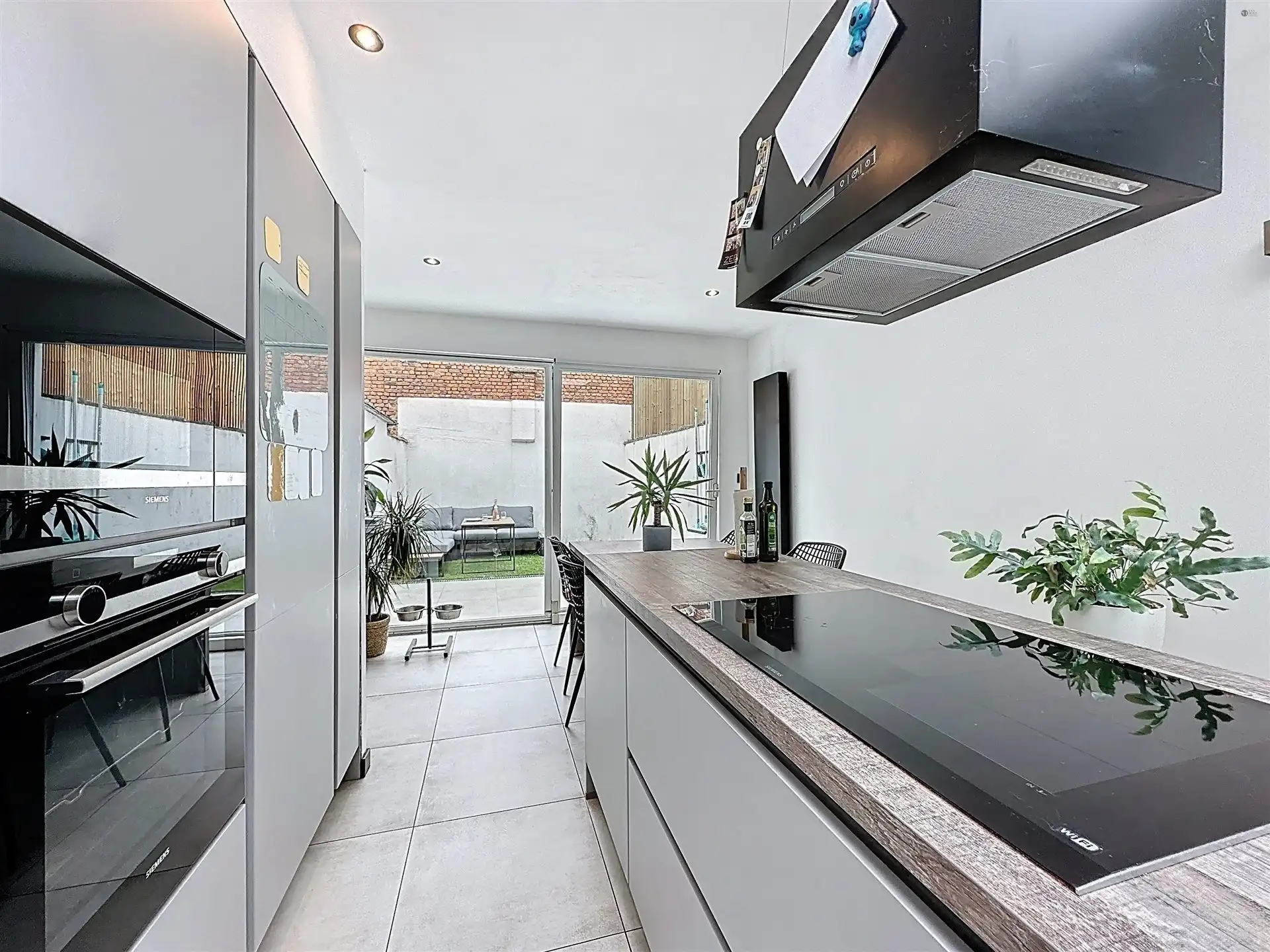 Instapklare woning met 3 slaapkamers en gezellige tuin. foto {{pictureIndex}}