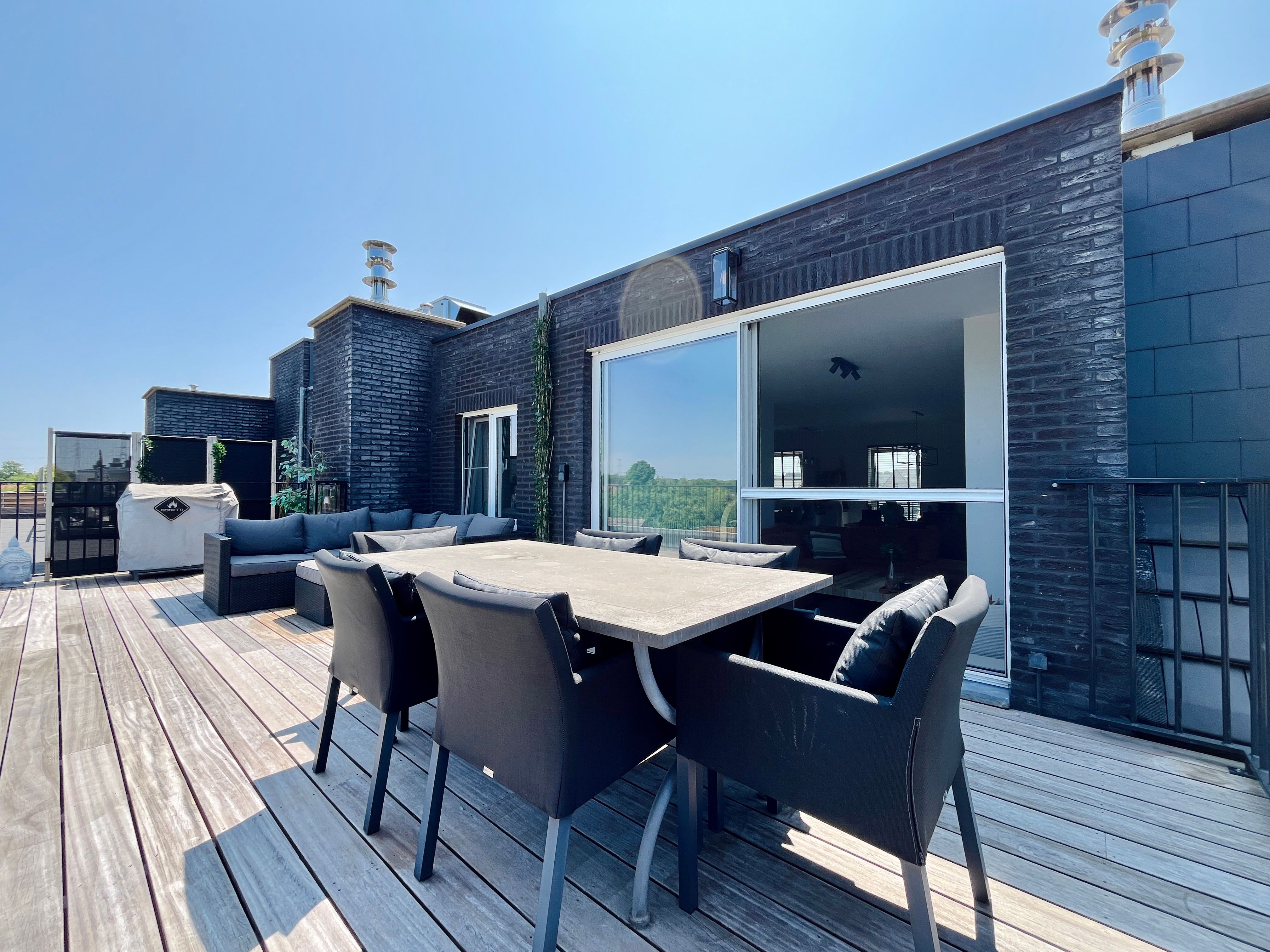Penthouse te koop in Lint.  Modern wonen met een vleugje rust in de Zuidrand van Antwerpen! foto 2