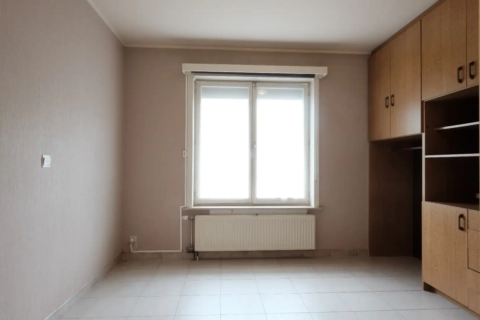 Centraal gelegen gelijkvloers 2-slaapkamerappartement — ideaal als starter of opbrengsteigendom foto 9