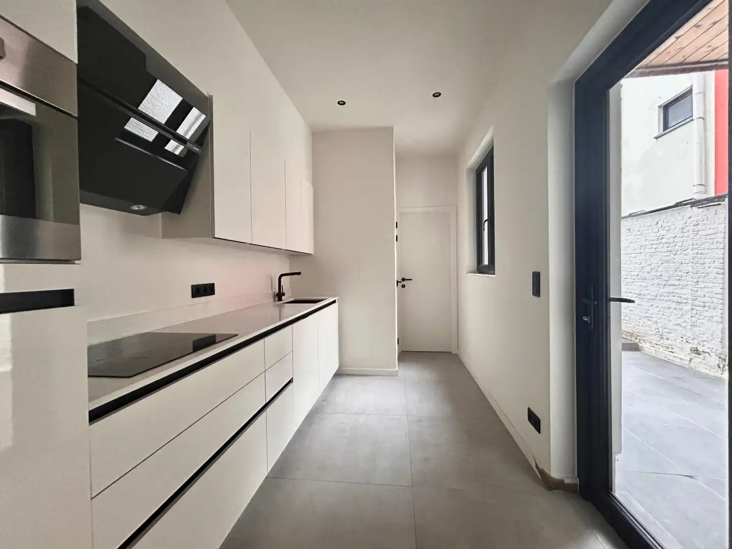 Gezellig gelijkvloers 2-slpk app met tuin. foto 6