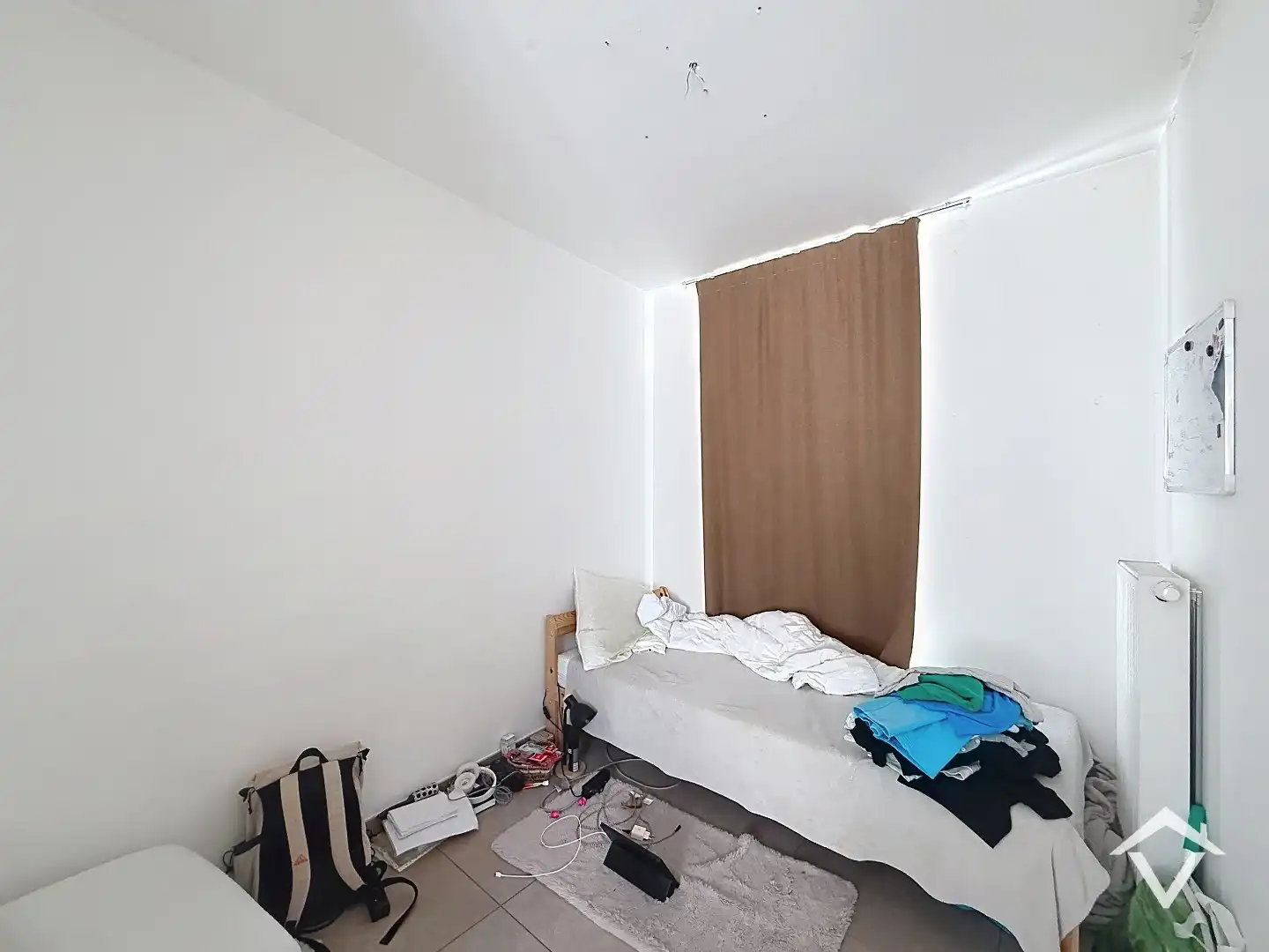 Bel-étagewoning met 2 slaapkamers, zonnig dakterras en ruime garage te centrum Roeselare foto 7