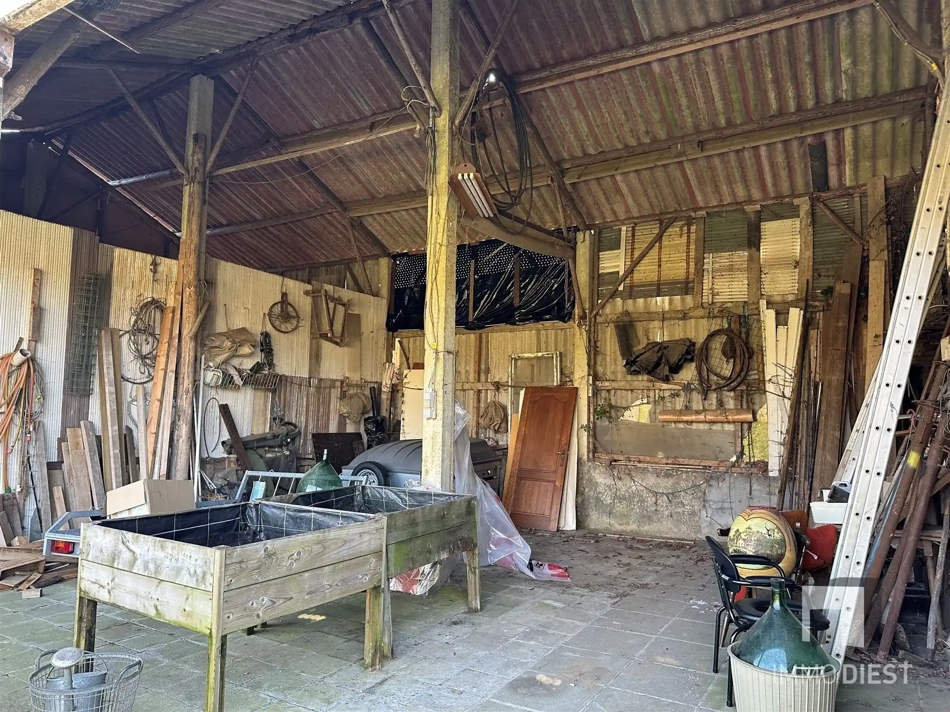 Woning met grote garage en stalling foto 39