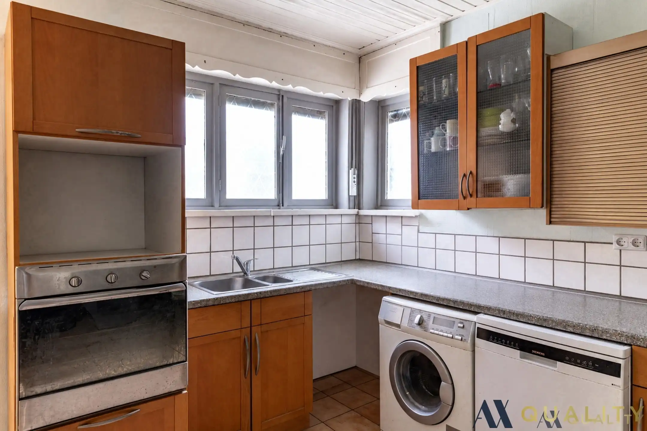 Te renoveren gesloten bebouwing met garage, ruime tuin en groenzicht in Oppuurs foto 7