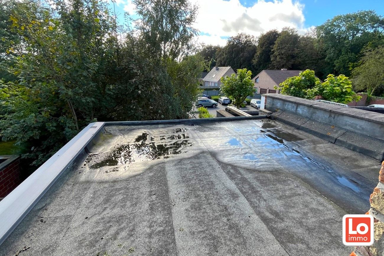 Te renoveren pand met tuin op een topligging in Centrum Lochristi foto 14