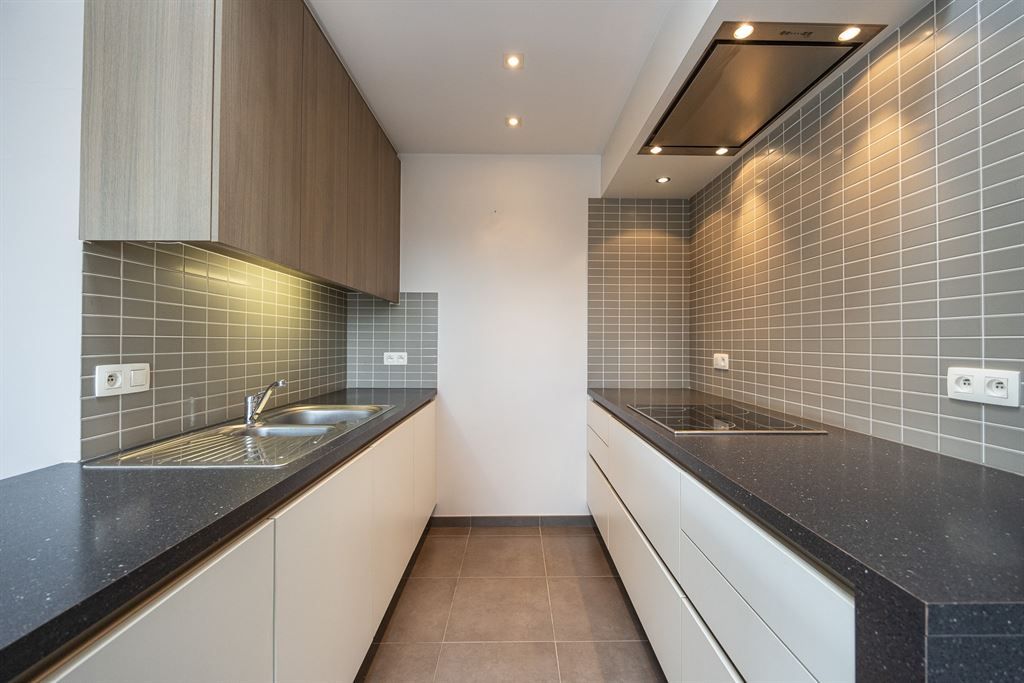 Zeer ruim duplexappartement in hartje Herent! foto 5