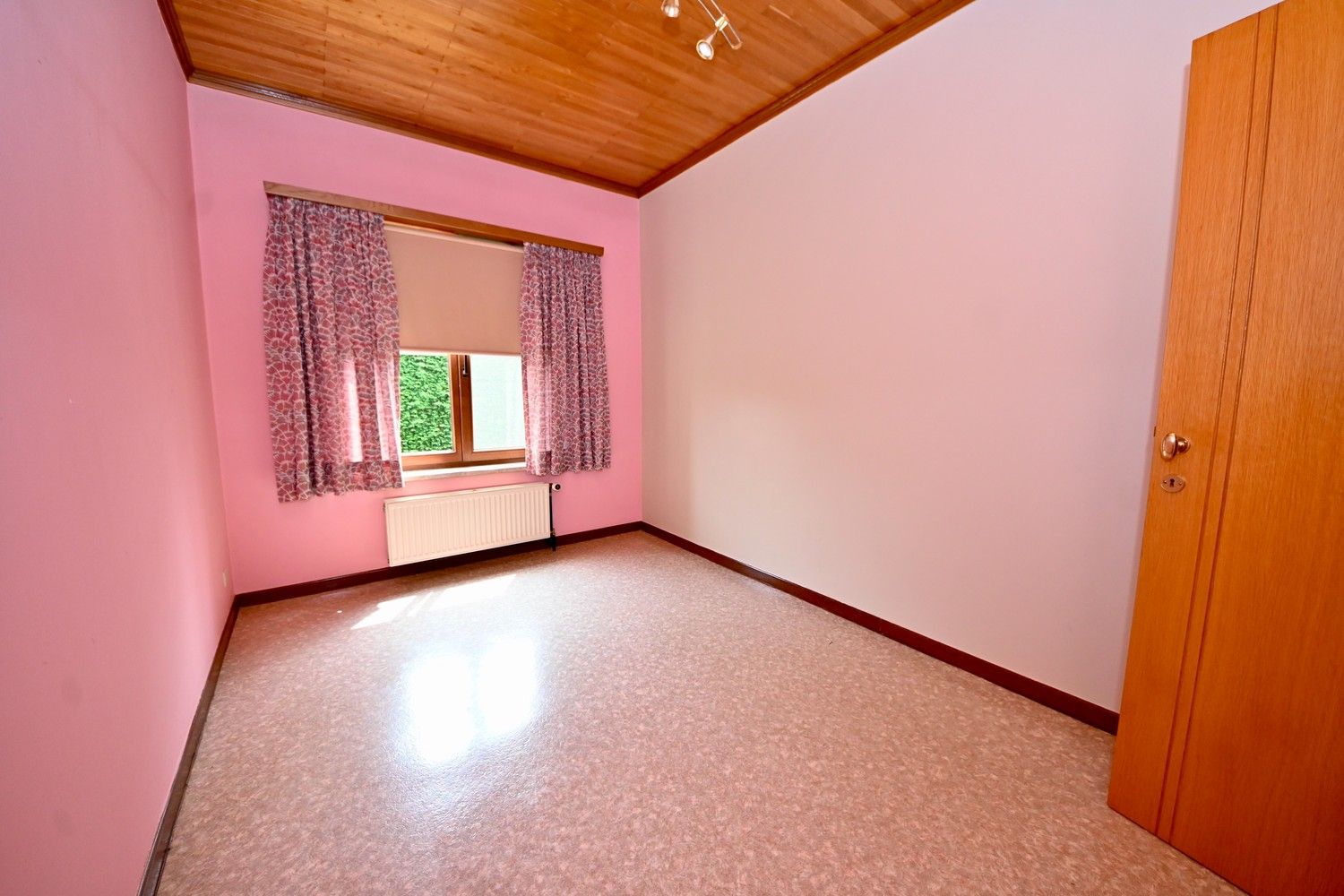 Rustig gelegen laagbouw woning met 2 slaapkamers, garage en tuin. foto 10
