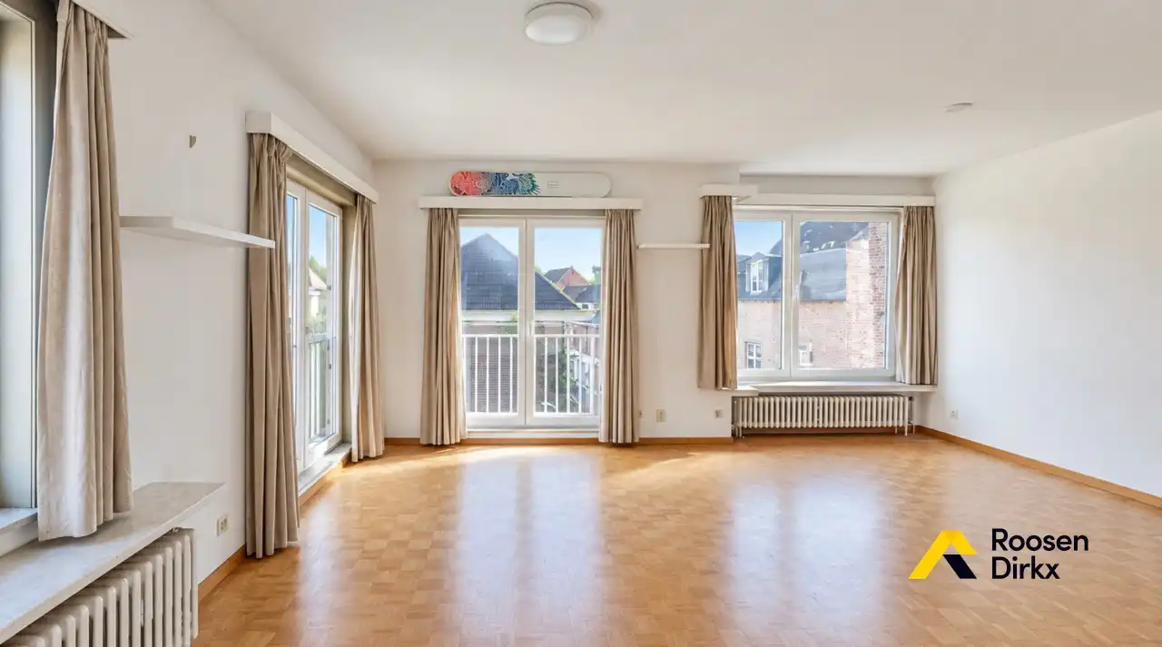 Appartement (95m²) met 2 slaapkamers in hartje Bree foto 2