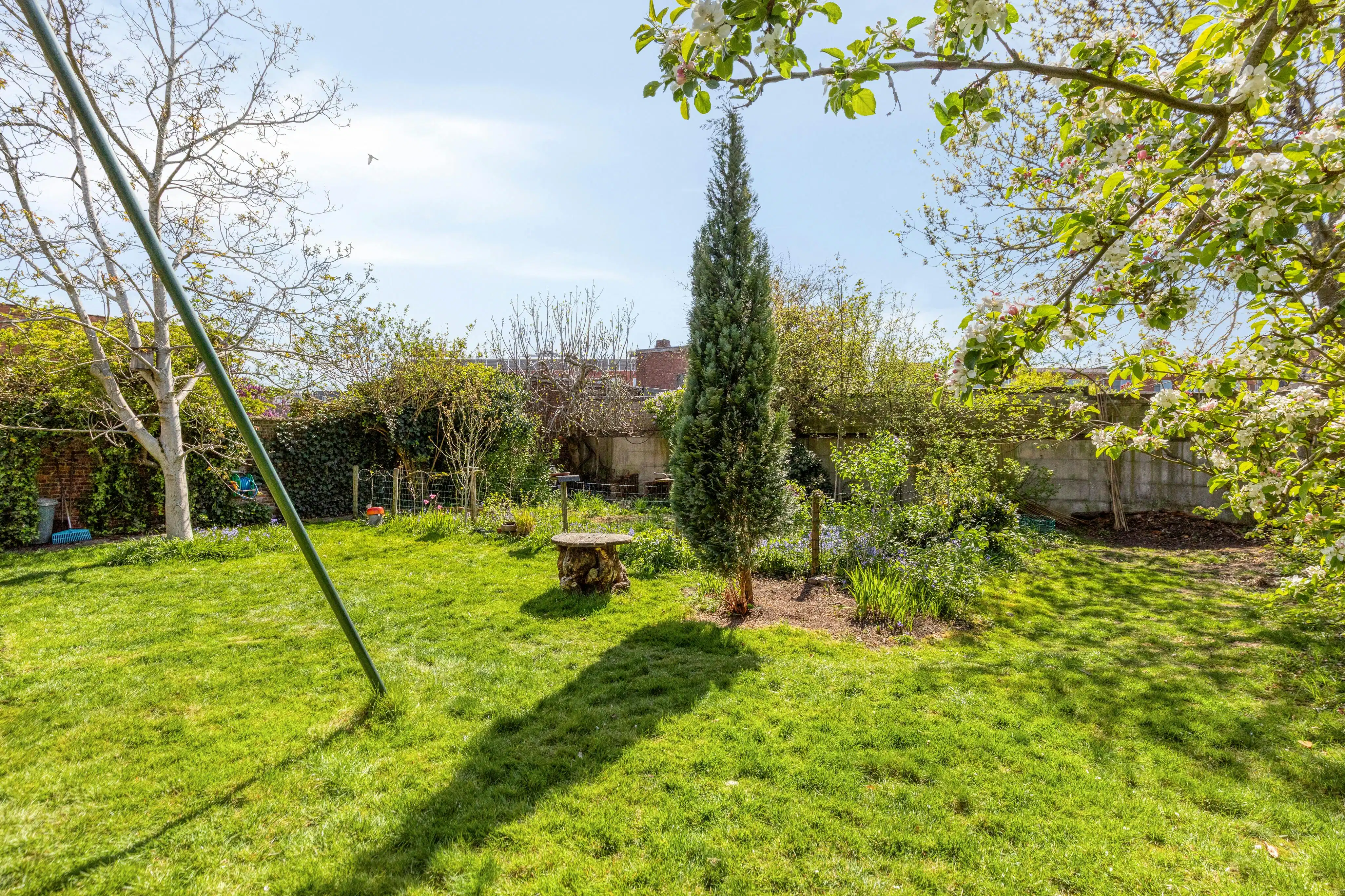 Charmant huis met ruime en zonnige tuin te koop in Merksem! foto 28