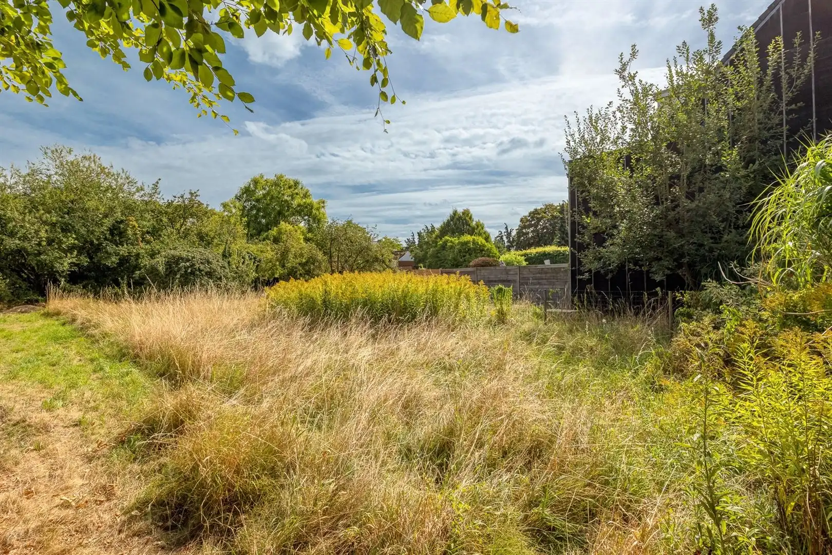 Bouwgrond voor halfopen woning in kindvriendelijke straat foto 4