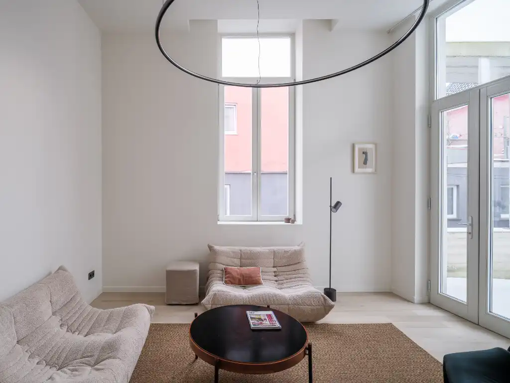 Architecturaal appartement (96 m2) met ruim buitenterras in centrum Gent foto {{pictureIndex}}