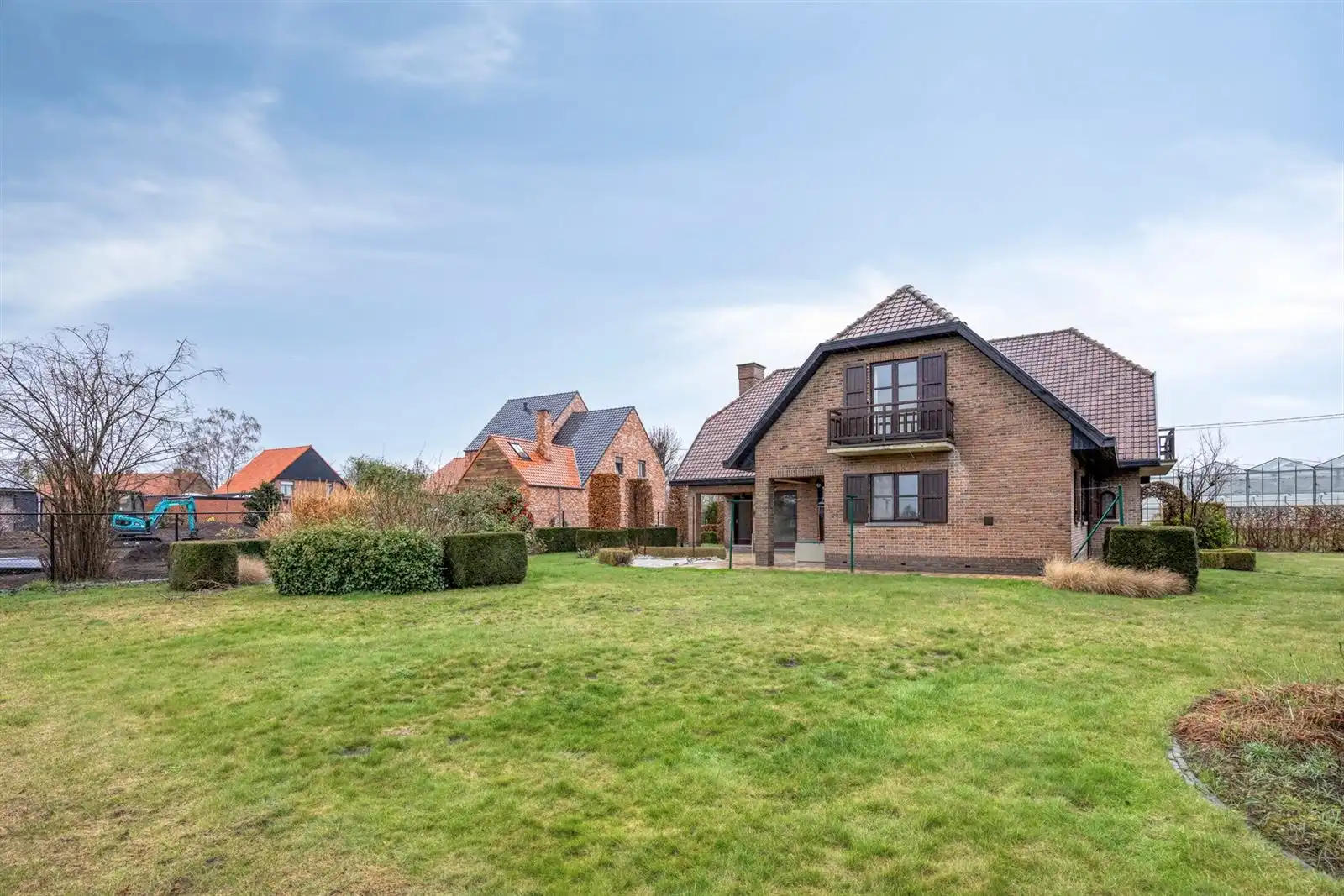 Riante open bebouwing in rustige straat foto 47