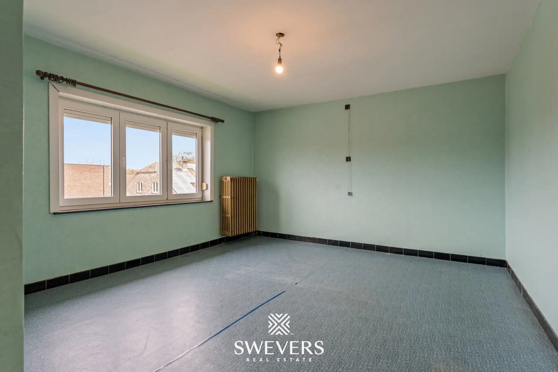 Ruime open bebouwing met potentieel en zuidgerichte tuin in rustige wijk van Houthalen foto 13