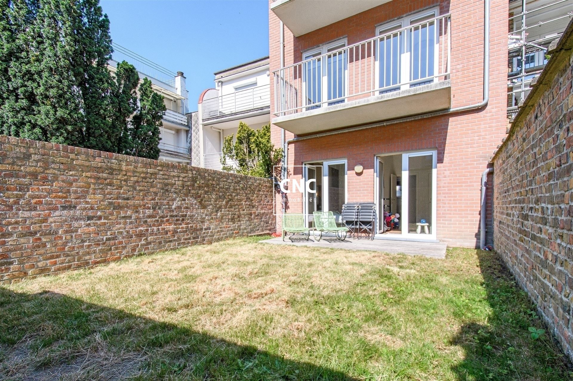 Gelijkvloers appartement met zonnige tuin nabij het centrum
 foto 13