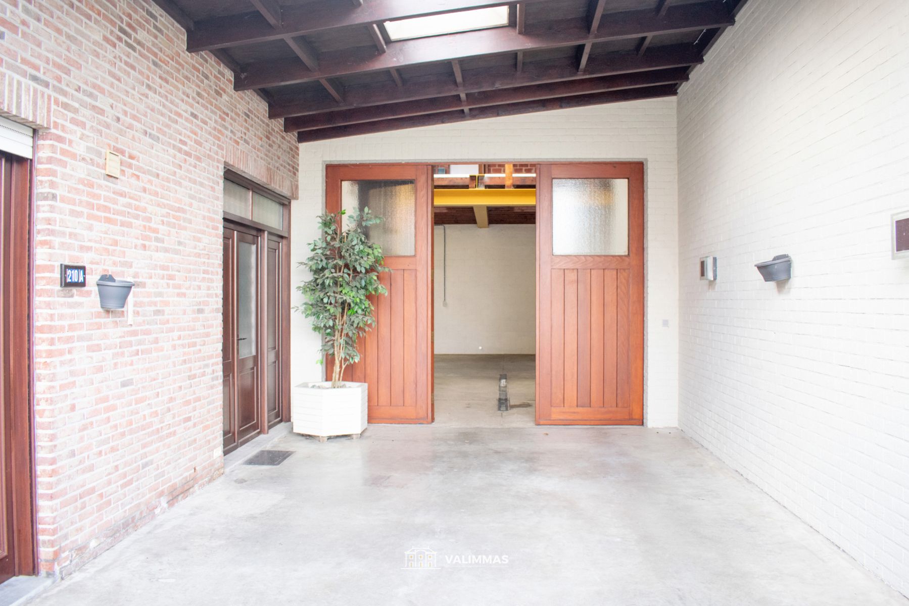 Zeer ruime (kangoeroe-)woning met parking en atelier/opslag foto 4